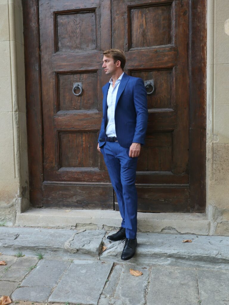 Man wearing a tailored blue Italian suit, Italian suits Dubai